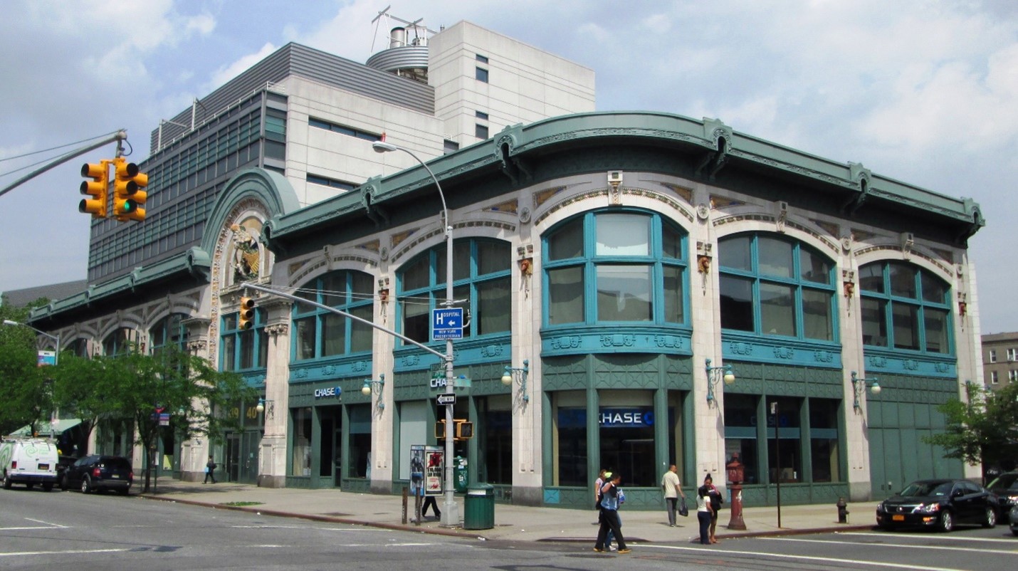 Contemporary color photo of the colorful Broadway façade of what was once home to the Audubon Ballroom.
