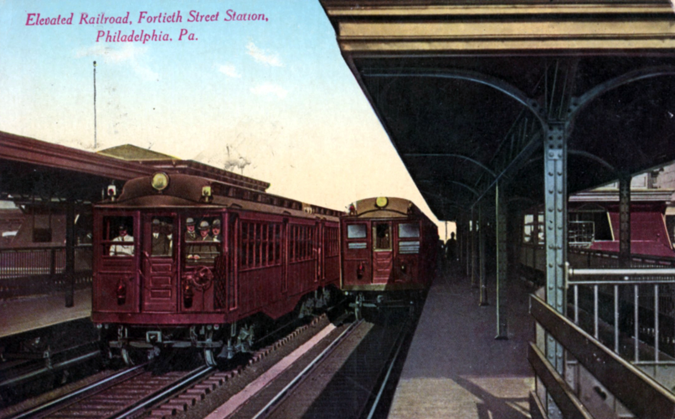 Two trains at elevated railroad station