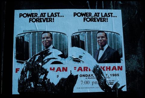A sky-blue graphic shows Louis Farrakhan’s smiling image in 1985. The text of the graphic reads POWER AT LAST/Farrakhan. The event it announces was to be held at New York’s Madison Square Garden.